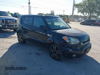 2011 Kia Soul + with VIN KNDJT2A22B7282062, listed as a IAAI auction lot 42035564 with 201,870 mi miles. Bid and sale history available at carsss.com. Image 1.