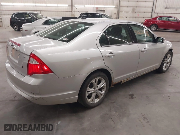 2012 Ford Fusion SE with VIN 3FAHP0HAXCR339239, listed as a IAAI auction lot 42622696 with 168,153 mi miles and . Bid and sale history available at DreamBid. Image 4.