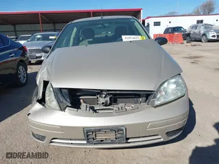 2007 Ford Focus S with VIN 1FAFP34N47W298854, listed as a IAAI auction lot 41814627 with 126,781 mi miles. Bid and sale history available at carsss.com. Image 13.