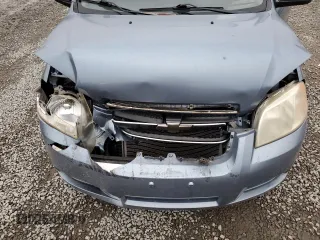 2007 Chevrolet Aveo LS z VIN KL1TD56607B126715, wystawiony jako Copart lot #85206134 z przebiegiem 85 420 mil mil oraz Szkody całkowita. Historia ofert i sprzedaży dostępna na DreamBid. Obrazek 12.