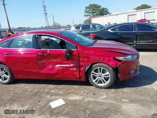 2015 Ford Fusion Energi Titanium with VIN 3FA6P0SU1FR202589, listed as a IAAI auction lot 41774824 with 93,000 mi miles. Bid and sale history available at carsss.com. Image 6.
