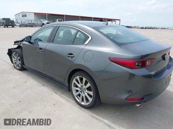 2023 Mazda 3 S Premium with VIN 3MZBPBDM3PM383238, listed as a IAAI auction lot 42477596 with 24,233 mi miles and . Bid and sale history available at DreamBid. Image 3.