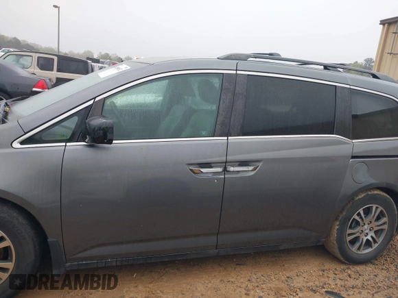 2011 Honda Odyssey EX-L with VIN 5FNRL5H66BB103352, listed as a IAAI auction lot 41901832 with 238,727 mi miles and . Bid and sale history available at carsss.com. Image 15.