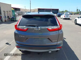2018 Honda CR-V Touring with VIN 7FARW1H90JE030766, listed as a IAAI auction lot 41637900 with Not Provided miles and . Bid and sale history available at DreamBid. Image 16.