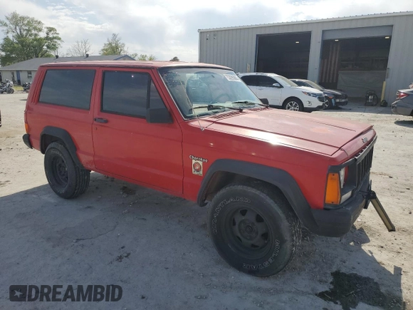 1995 Jeep Cherokee SE with VIN 1J4FT27P9SL561969, listed as a Copart auction lot 53295865 with 151,377 mi miles and Salvage title. Bid and sale history available at DreamBid. Image 4.