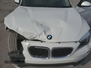 2015 BMW X1 sDrive28i with VIN WBAVM1C50FV498720, listed as a Copart auction lot 80381264 with 0 mi miles and Salvage Title. Bid and sale history available at carsss.com. Image 12.