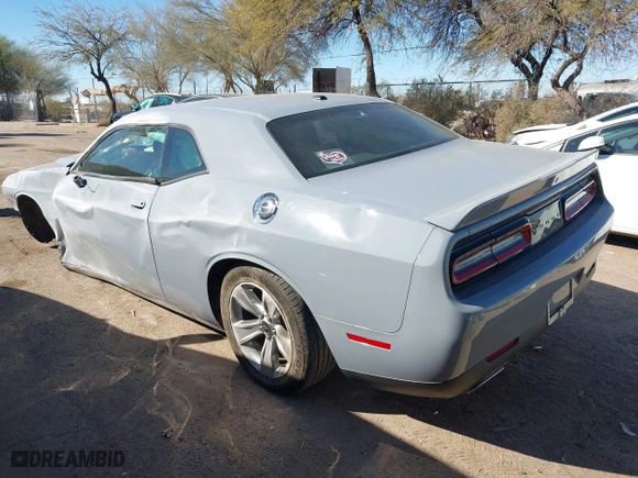 2021 Dodge Challenger SXT with VIN 2C3CDZAG5MH534621, listed as a IAAI auction lot 41667234 with 78,947 mi miles. Bid and sale history available at carsss.com. Image 3.
