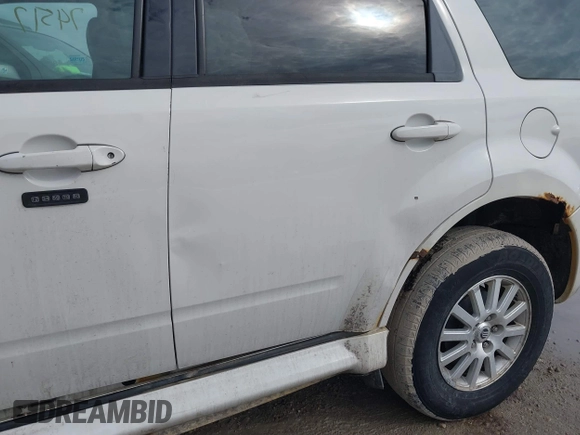 2009 Mercury Mariner Premier with VIN 4M2CU97G19KJ01231, listed as a IAAI auction lot 41674517 with Not Provided miles and . Bid and sale history available at DreamBid. Image 12.