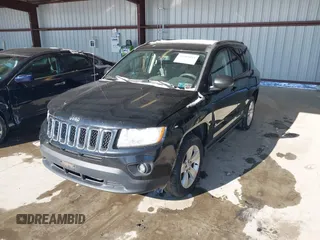 2013 Jeep Compass Sport with VIN 1C4NJDBB7DD271922, listed as a IAAI auction lot 41389045 with 26,886 mi miles. Bid and sale history available at carsss.com. Image 2.