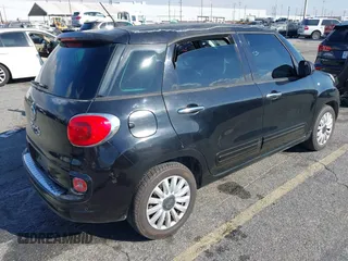 2014 FIAT 500L Easy with VIN ZFBCFABH6EZ001258, listed as a IAAI auction lot 41354892 with 67,852 mi miles and . Bid and sale history available at DreamBid. Image 4.