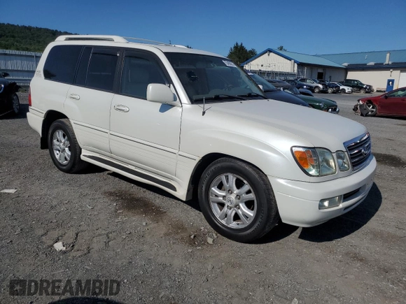 2004 Lexus LX 470 with VIN JTJHT00W243539249, listed as a Copart auction lot 70493974 with 181,155 mi miles and Clean Title. Bid and sale history available at DreamBid. Image 4.