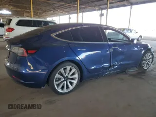 2020 Tesla Model 3 Standard Range Plus z VIN 5YJ3E1EA1LF744069, wystawiony jako Copart lot #53437085 z przebiegiem 121 845 mil mil oraz Szkoda całkowita • Salvage title. Historia ofert i sprzedaży dostępna na DreamBid. Obrazek 3.