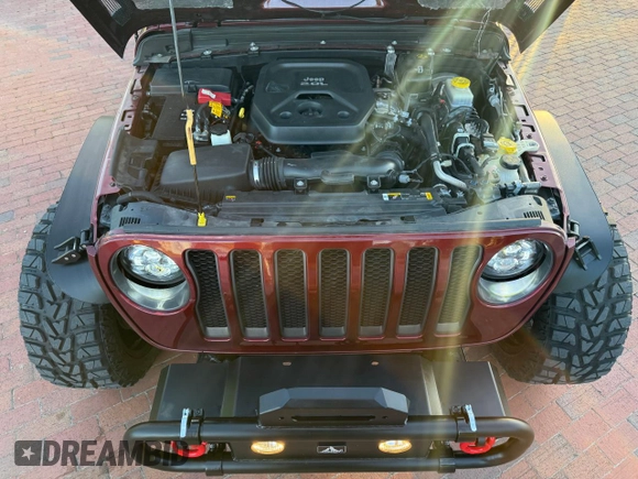 2021 Jeep Wrangler Unlimited Willys with VIN 1C4HJXDNXMW680247, listed as a Copart auction lot 57000145 with 77,407 mi miles and Clean Title. Bid and sale history available at DreamBid. Image 7.