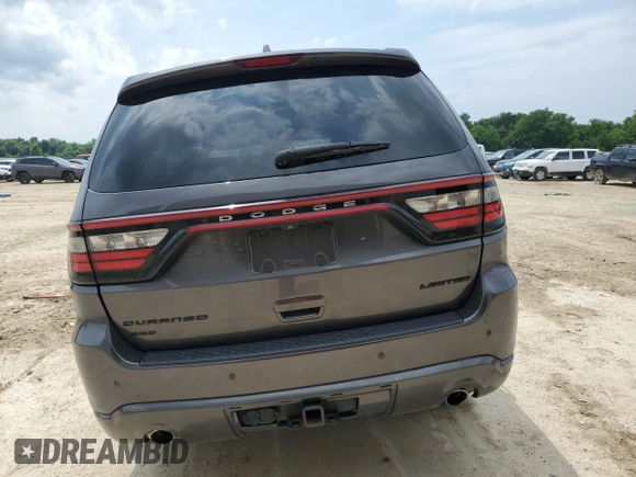 2015 Dodge Durango Limited with VIN 1C4RDJDG0FC904897, listed as a Copart auction lot 58985025 with 147,139 mi miles and Salvage title. Bid and sale history available at DreamBid. Image 6.
