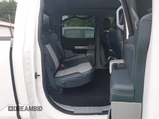 2021 Ford F-150 XL with VIN 1FTFW1E8XMFA69505, listed as a IAAI auction lot 42446323 with 58,214 mi miles and . Bid and sale history available at DreamBid. Image 8.