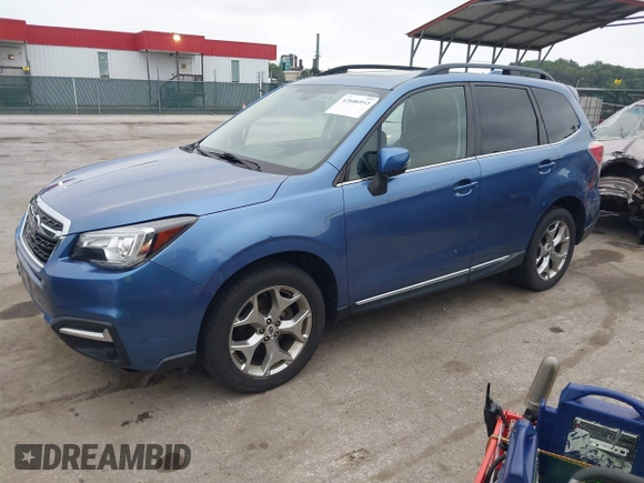 2018 Subaru Forester Touring with VIN JF2SJAWC6JH597365, listed as a IAAI auction lot 42606953 with 66,340 mi miles and . Bid and sale history available at DreamBid. Image 2.