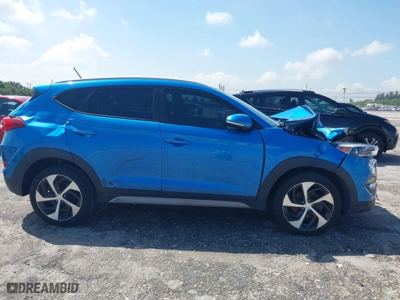 2017 Hyundai Tucson Value with VIN KM8J33A23HU540472, listed as a IAAI auction lot 41935056 with 58,937 mi miles. Bid and sale history available at carsss.com. Image 13.