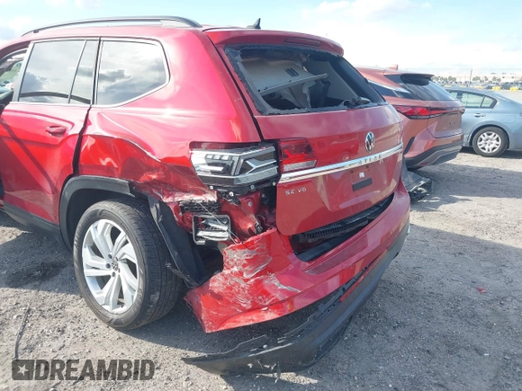2021 Volkswagen Atlas SE z VIN 1V2WR2CA3MC526612, wystawiony jako IAAI lot #41625077 z przebiegiem 70 856 mil mil oraz . Historia ofert i sprzedaży dostępna na DreamBid. Obrazek 6.