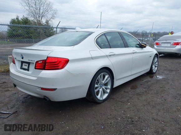 2014 BMW 5 Series 535i xDrive with VIN WBA5B3C50ED292545, listed as a IAAI auction lot 41841578 with 99,072 mi miles and . Bid and sale history available at carsss.com. Image 4.