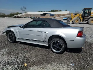2001 Ford Mustang Deluxe with VIN 1FAFP44451F186147, listed as a Copart auction lot 51152565 with 0 mi miles and Salvage Title. Bid and sale history available at carsss.com. Image 2.