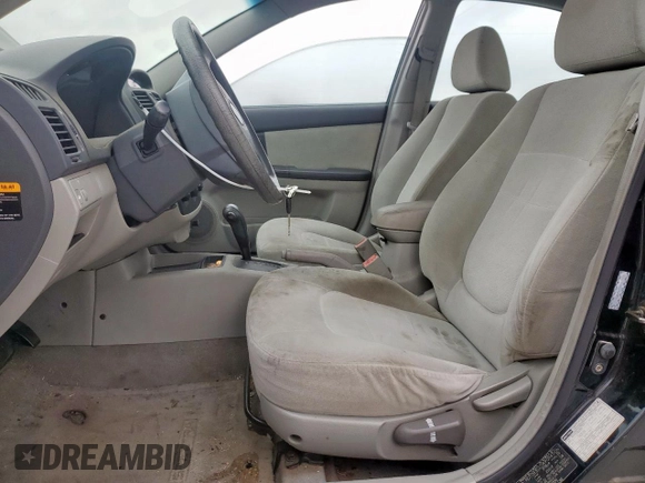 2005 Kia Spectra LX with VIN KNAFE121255179334, listed as a Copart auction lot 53144295 with 147,989 mi miles and Clean Title. Bid and sale history available at carsss.com. Image 7.