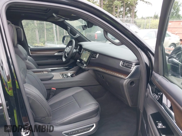 2023 Jeep Grand Wagoneer with VIN 1C4SJVEJ2PS573498, listed as a IAAI auction lot 42684957 with 7,334 mi miles and . Bid and sale history available at DreamBid. Image 5.