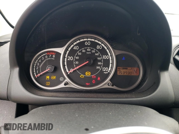 2012 Mazda 2 Sport with VIN JM1DE1KY1C0140803, listed as a Copart auction lot 83420714 with 153,730 mi miles and Salvage Title. Bid and sale history available at DreamBid. Image 9.
