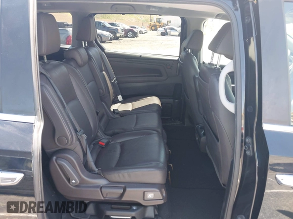 2018 Honda Odyssey Touring with VIN 5FNRL6H8XJB026247, listed as a IAAI auction lot 42298961 with 66,571 mi miles and . Bid and sale history available at DreamBid. Image 8.