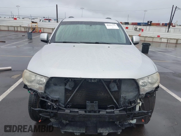 2013 Dodge Durango Crew z VIN 1C4RDJDGXDC637572, wystawiony jako IAAI lot #41922757 z przebiegiem 110 941 mil mil oraz . Historia ofert i sprzedaży dostępna na DreamBid. Obrazek 6.