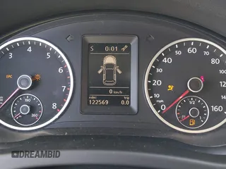 2012 Volkswagen Tiguan SE with VIN WVGAV7AX8CW565863, listed as a IAAI auction lot 41528643 with 122,569 mi miles and . Bid and sale history available at DreamBid. Image 7.