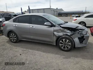 2023 Kia Rio S with VIN 3KPA24AD1PE552714, listed as a Copart auction lot 49243375 with 50,657 mi miles and Salvage Title. Bid and sale history available at carsss.com. Image 4.