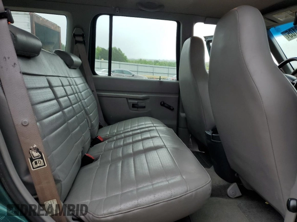 1999 Ford Explorer XL z VIN 1FMZU34X6XUC27678, wystawiony jako Copart lot #57073105 z przebiegiem 228 525 mil mil oraz Czysty tytuł • Clean title. Historia ofert i sprzedaży dostępna na DreamBid. Obrazek 11.