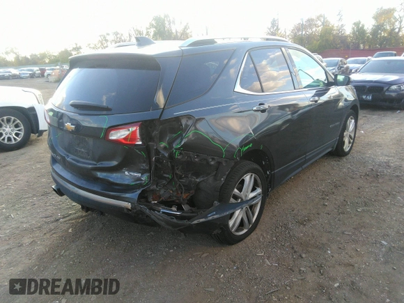 2018 Chevrolet Equinox Premier with VIN 2GNAXNEXXJ6141676, listed as a IAAI auction lot 40798630 with 132,960 mi miles. Bid and sale history available at carsss.com. Image 4.