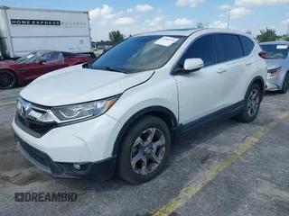 2019 Honda CR-V EX with VIN 5J6RW1H51KA007719, listed as a IAAI auction lot 41985574 with 58,696 mi miles. Bid and sale history available at carsss.com. Image 17.