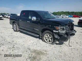 2021 Nissan Titan SL z VIN 1N6AA1ED6MN511883, wystawiony jako Copart lot #57115084 z przebiegiem 48 293 mil mil oraz Szkoda całkowita • Salvage title. Historia ofert i sprzedaży dostępna na DreamBid. Obrazek 11.
