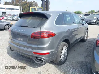 2016 Porsche Cayenne with VIN WP1AA2A21GKA15990, listed as a IAAI auction lot 41978980 with 141,738 mi miles. Bid and sale history available at carsss.com. Image 4.