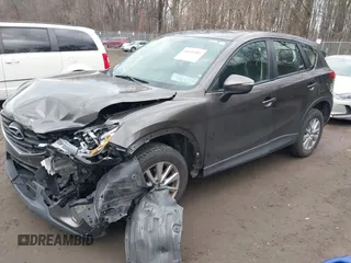 2016 Mazda CX-5 Sport with VIN JM3KE4BY8G0895209, listed as a IAAI auction lot 41688405 with 115,954 mi miles. Bid and sale history available at carsss.com. Image 2.