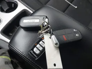 2020 Jeep Grand Cherokee Altitude z VIN 1C4RJFAGXLC125416, wystawiony jako IAAI lot #42216471 z przebiegiem 66 326 mil mil oraz . Historia ofert i sprzedaży dostępna na DreamBid. Obrazek 11.
