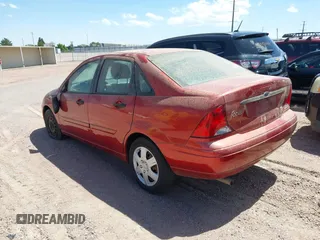 2004 Ford Focus with VIN 1FAHP34314W143472, listed as a IAAI auction lot 42192728 with 206,234 mi miles and . Bid and sale history available at DreamBid. Image 3.