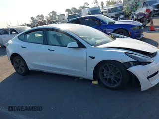 2022 Tesla Model 3 with VIN 5YJ3E1EA4NF319237, listed as a IAAI auction lot 41263761 with 44,384 mi miles and . Bid and sale history available at DreamBid. Image 13.