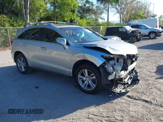 2014 Acura RDX Tech Pkg with VIN 5J8TB3H50EL014951, listed as a IAAI auction lot 41562583 with 129,833 mi miles. Bid and sale history available at carsss.com. Image 1.