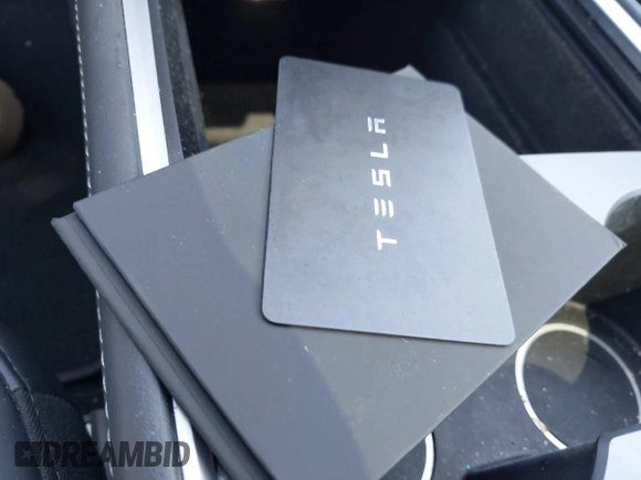 2024 Tesla Model Y Long Range with VIN 7SAYGDEE6RA225161, listed as a IAAI auction lot 42083140 with 28,289 mi miles and . Bid and sale history available at DreamBid. Image 11.