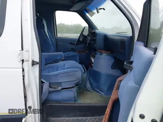1996 Ford Econoline Cargo z VIN 1FDEE14H0THB33890, wystawiony jako IAAI lot #42460711 z przebiegiem 283 645 mil mil oraz . Historia ofert i sprzedaży dostępna na DreamBid. Obrazek 5.