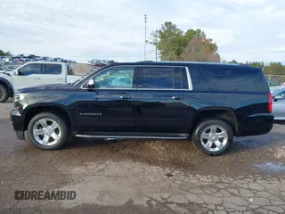 2020 Chevrolet Suburban Premier with VIN 1GNSCJKC0LR121728, listed as a IAAI auction lot 41105003 with 43,820 mi miles and . Bid and sale history available at DreamBid. Image 14.