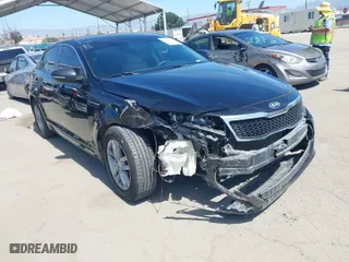 2012 Kia Optima LX with VIN 5XXGM4A71CG082636, listed as a IAAI auction lot 41862116 with 141,753 mi miles. Bid and sale history available at carsss.com. Image 1.