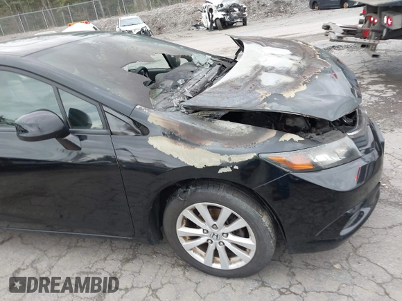 2012 Honda Civic EX with VIN 2HGFB2F84CH316659, listed as a IAAI auction lot 42217190 with 124,198 mi miles and . Bid and sale history available at DreamBid. Image 13.