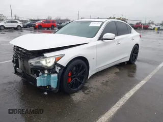 2015 Infiniti Q50 Premium with VIN JN1BV7AR1FM393866, listed as a IAAI auction lot 41807059 with 79,300 mi miles. Bid and sale history available at carsss.com. Image 2.