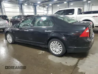 2012 Ford Fusion Hybrid с VIN 3FADP0L33CR231536, выставлен на аукционе Copart как лот 55330545 с пробегом 165 481 миль миль и Списание • Salvage title. История ставок и продаж доступна на DreamBid. Изображение 2.