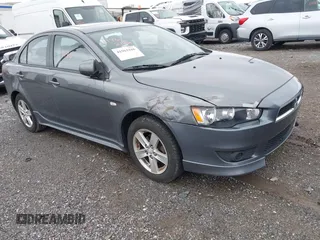 2009 Mitsubishi Lancer ES with VIN JA3AU26U69U042899, listed as a IAAI auction lot 41962186 with 179,262 mi miles. Bid and sale history available at carsss.com. Image 1.