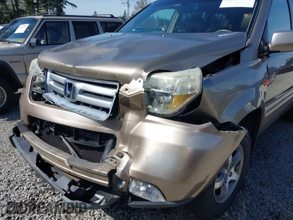 2006 Honda Pilot EX-L with VIN 2HKYF18566H561371, listed as a IAAI auction lot 41950296 with 145,579 mi miles and . Bid and sale history available at DreamBid. Image 6.